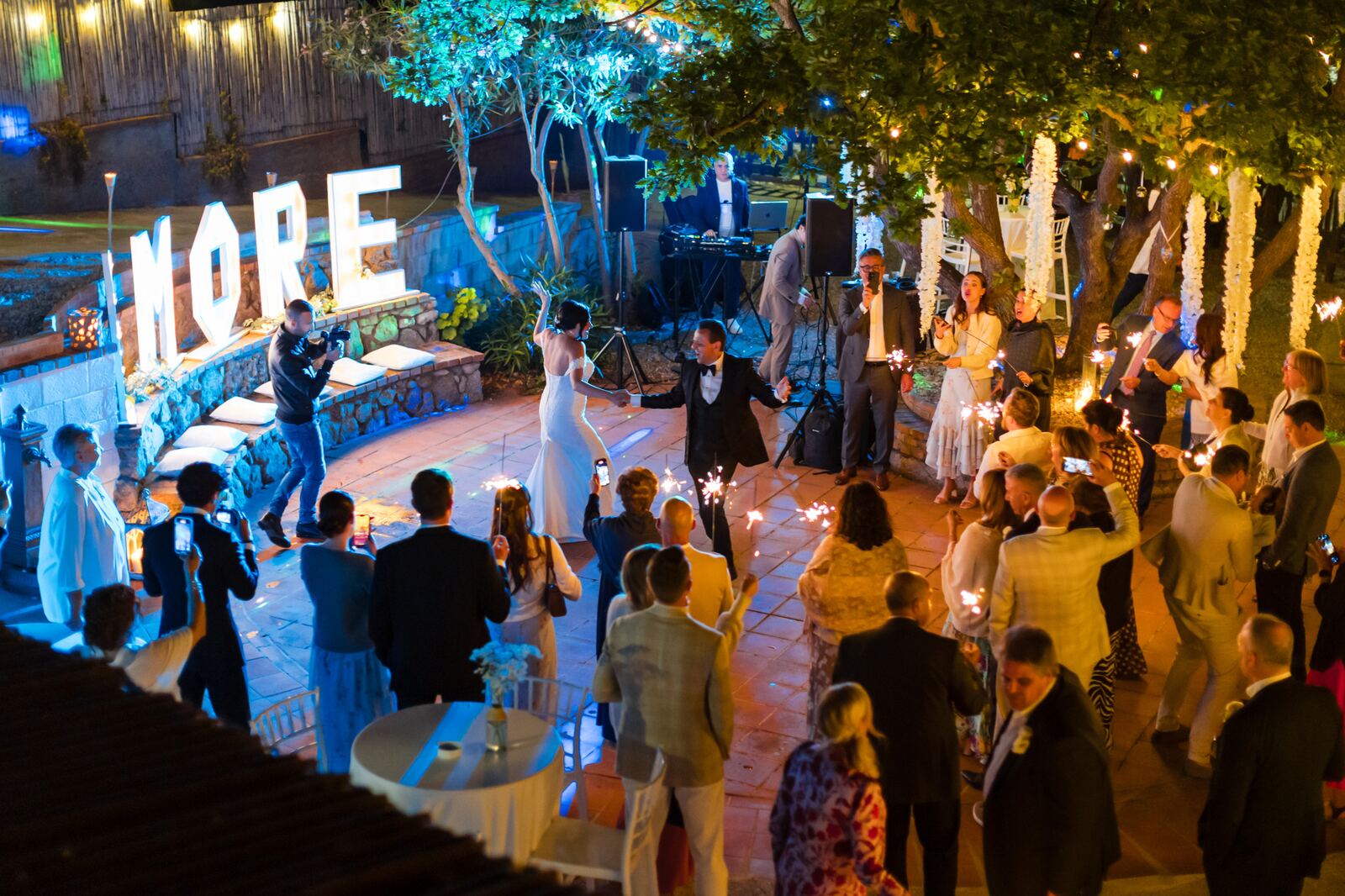 Dancing beneath the AMORE sign