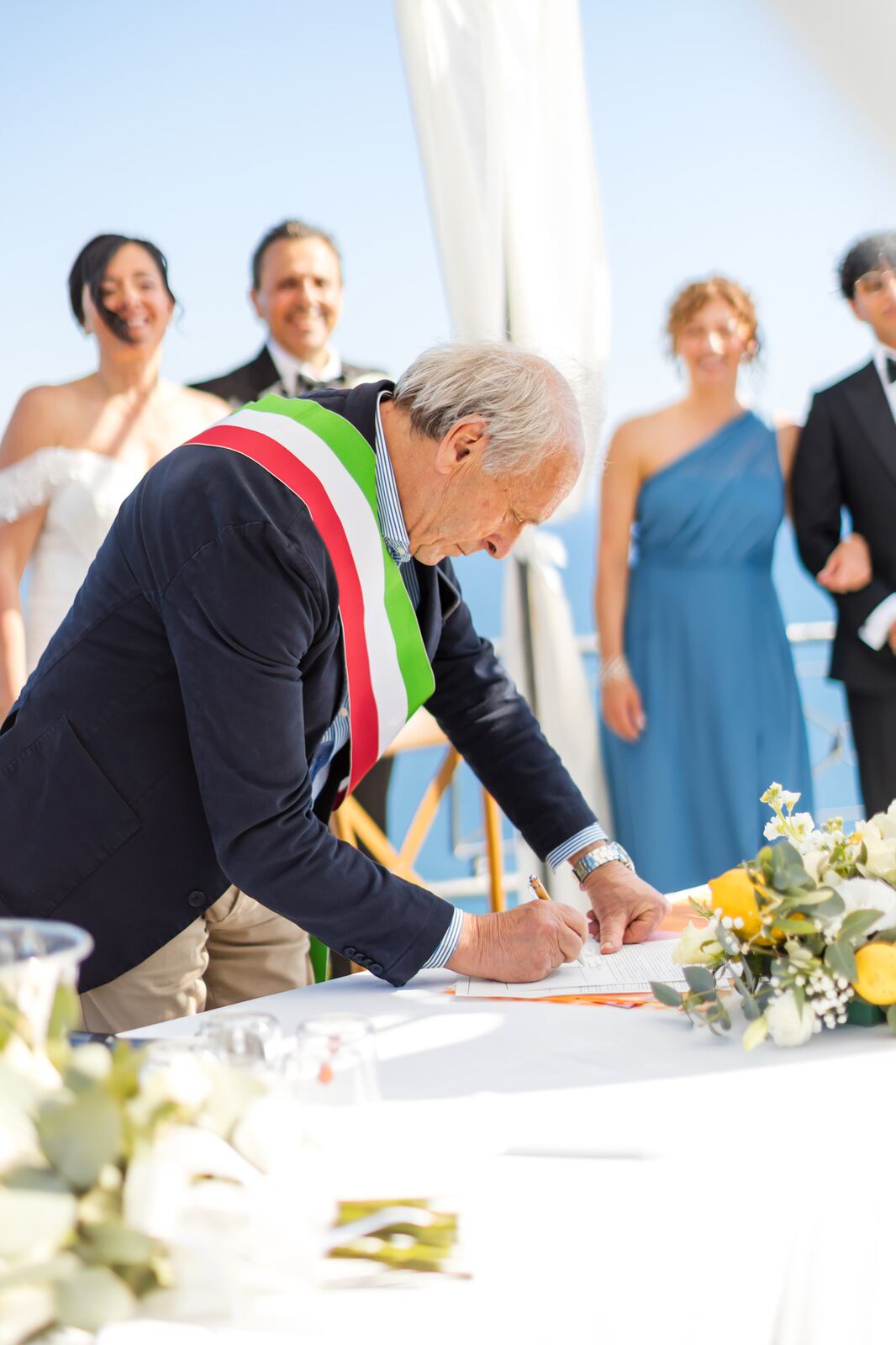 Signing the register with the officiant